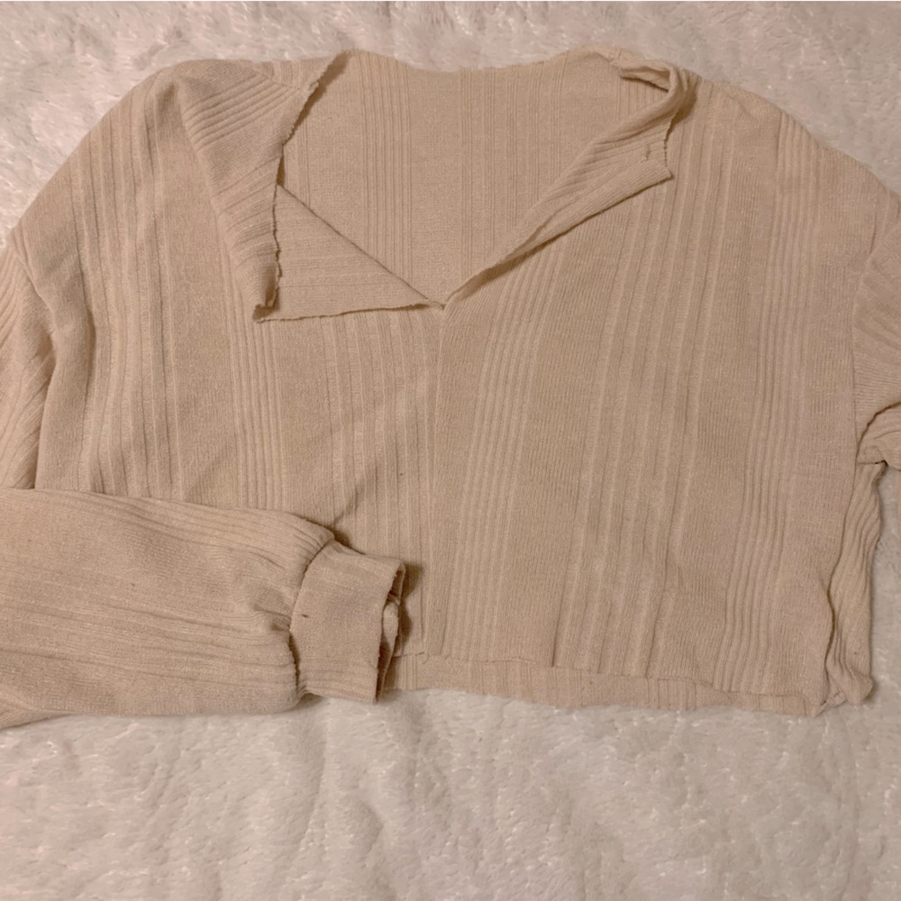 S/M. Cream or beige. Brand: Garage. Long sleeve crop top
